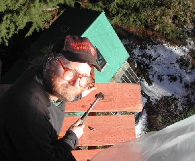 Building a scaffold before the window can be installed.  The secret to working high up?  Don't look down.