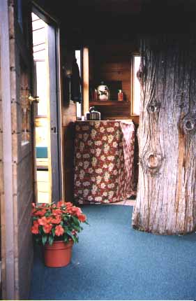 Kitchen facilities and doorway to south-facing sunroom