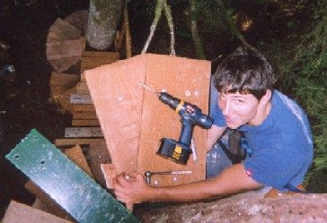 Bolting the wooden treads onto the steel support treads.