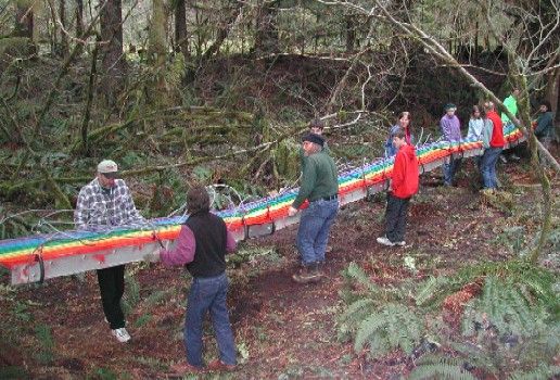 Crew prepares to uncable and carry the bridge.